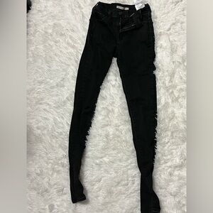 Levi high rise supper skinny size 23